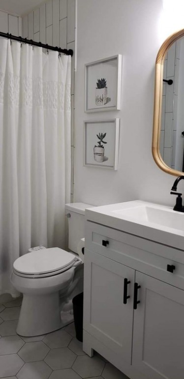 96414 Chester Road Yulee, FL 32097 - Photo 11 of 13 a bathroom with a sink and a toilet