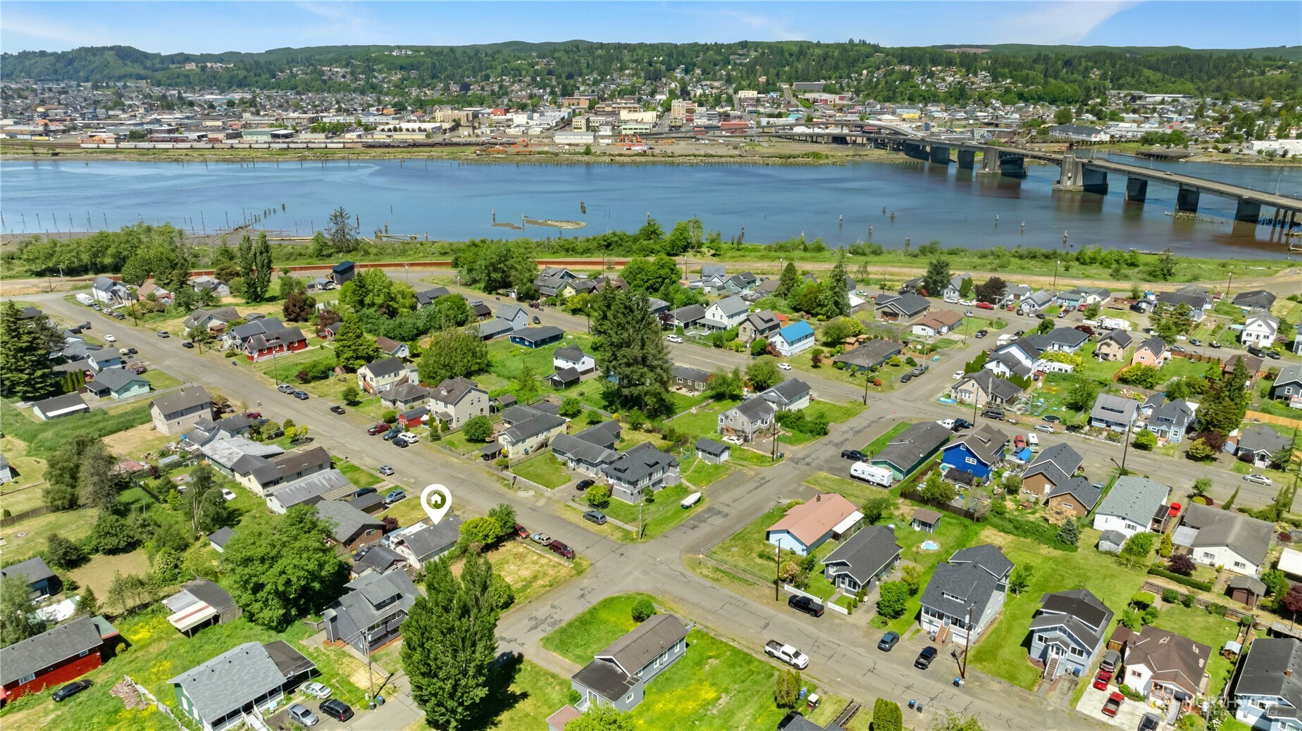 1105 West Perry Street Aberdeen, WA 98520 - Photo 7 of 20 an aerial view of residential houses with outdoor space and river