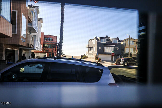 3661 Sunset Lane Oxnard, CA 93035 - Photo 14 of 14 a car parked on the side of a street