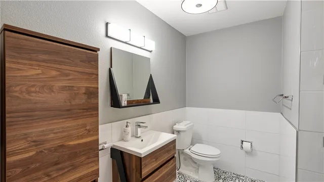 a work room with furniture and stairs