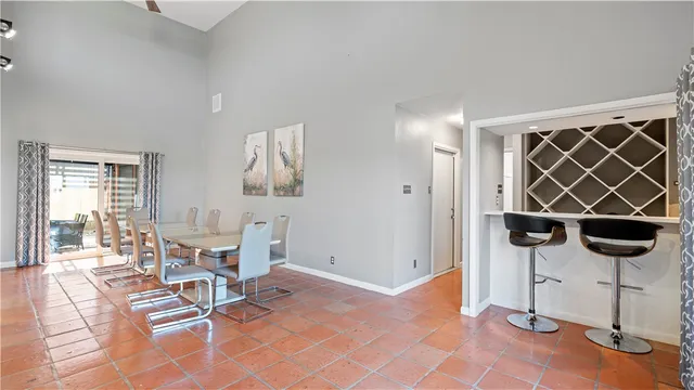 a view of a livingroom with furniture and white walls