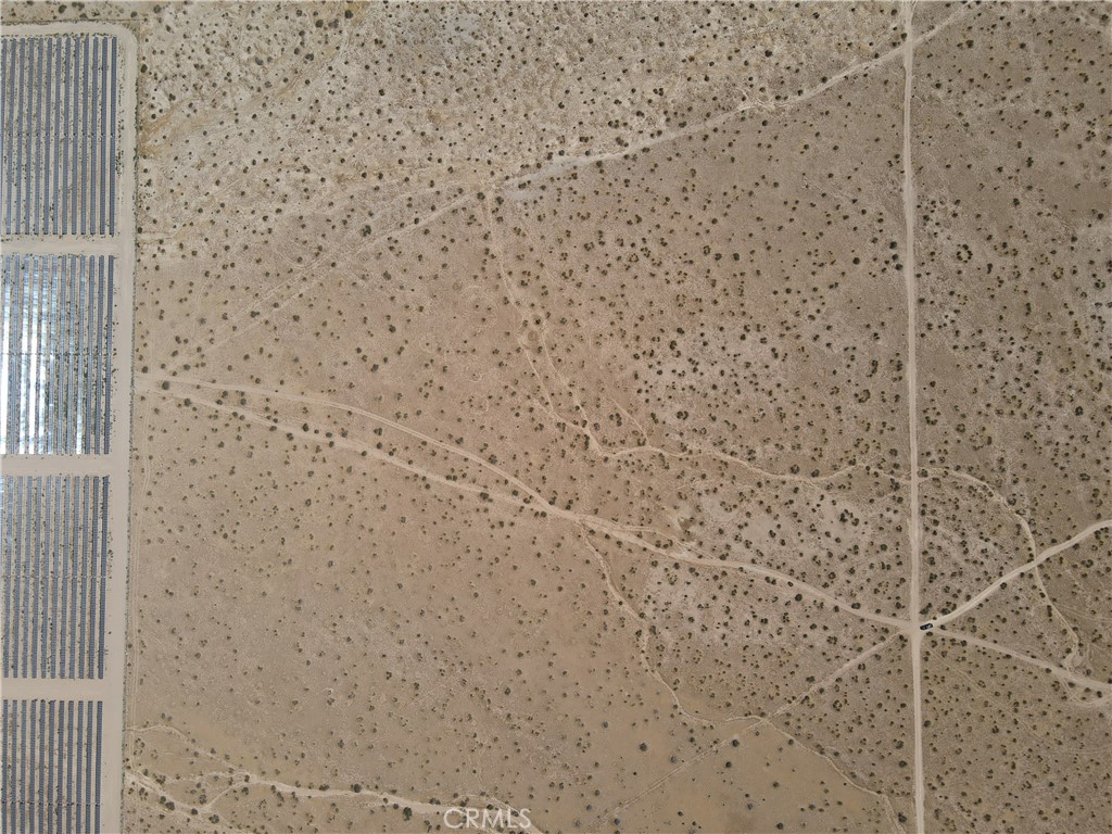 4 Caughlin Road Adelanto, CA 92301 - Photo 5 of 14 a bathroom with a shower
