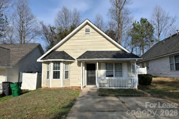 a front view of a house with a porch