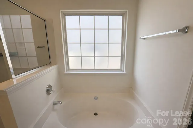 a bathroom with a bathtub