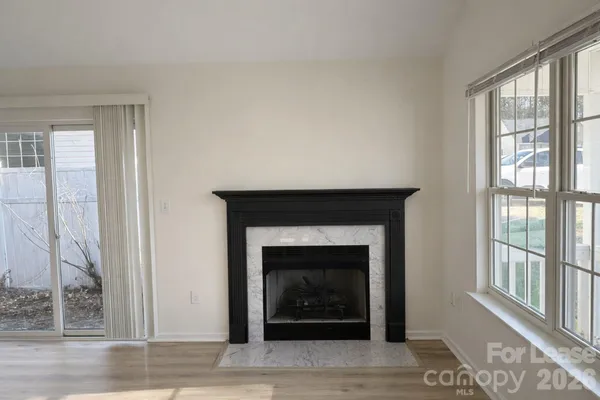 a living room with a fireplace