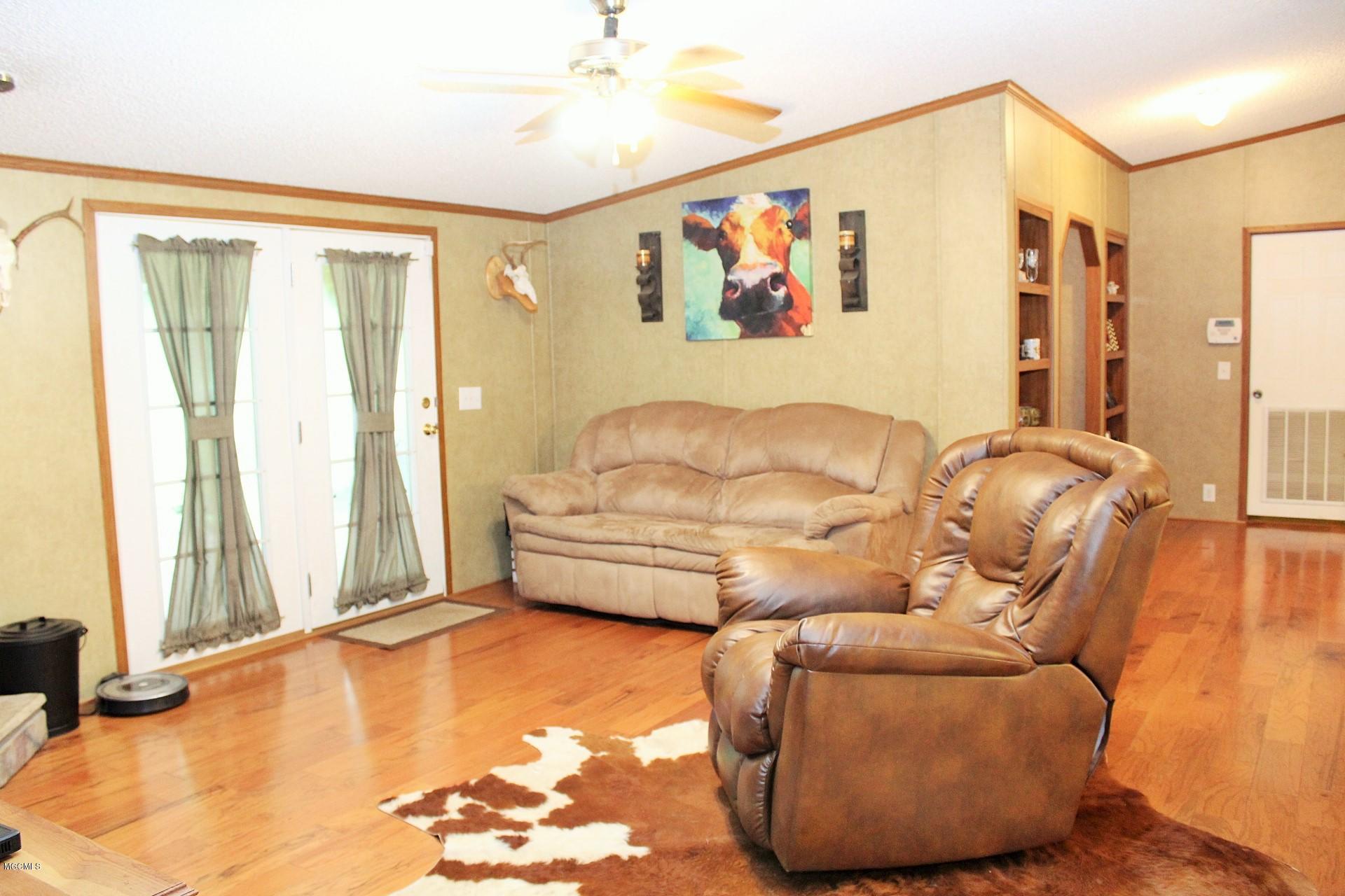 2297 Mt Pleasant Road Lucedale, MS 39452 - Photo 22 of 44 Living Room 2
