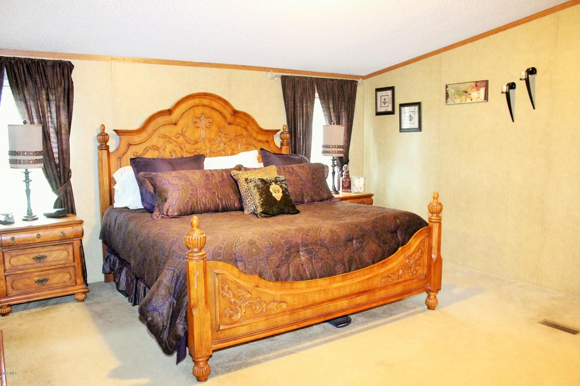 2297 Mt Pleasant Road Lucedale, MS 39452 - Photo 27 of 44 Master Bedroom