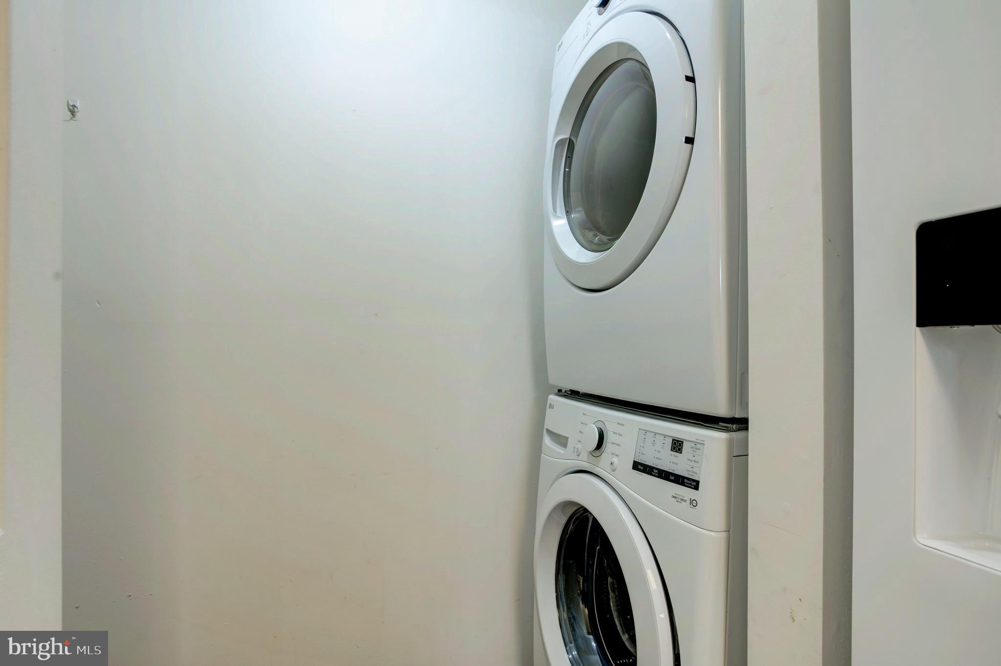 14174 Cuddy Loop, Unit 204 Woodbridge, VA 22193 - Photo 12 of 24 a utility room with dryer and washer