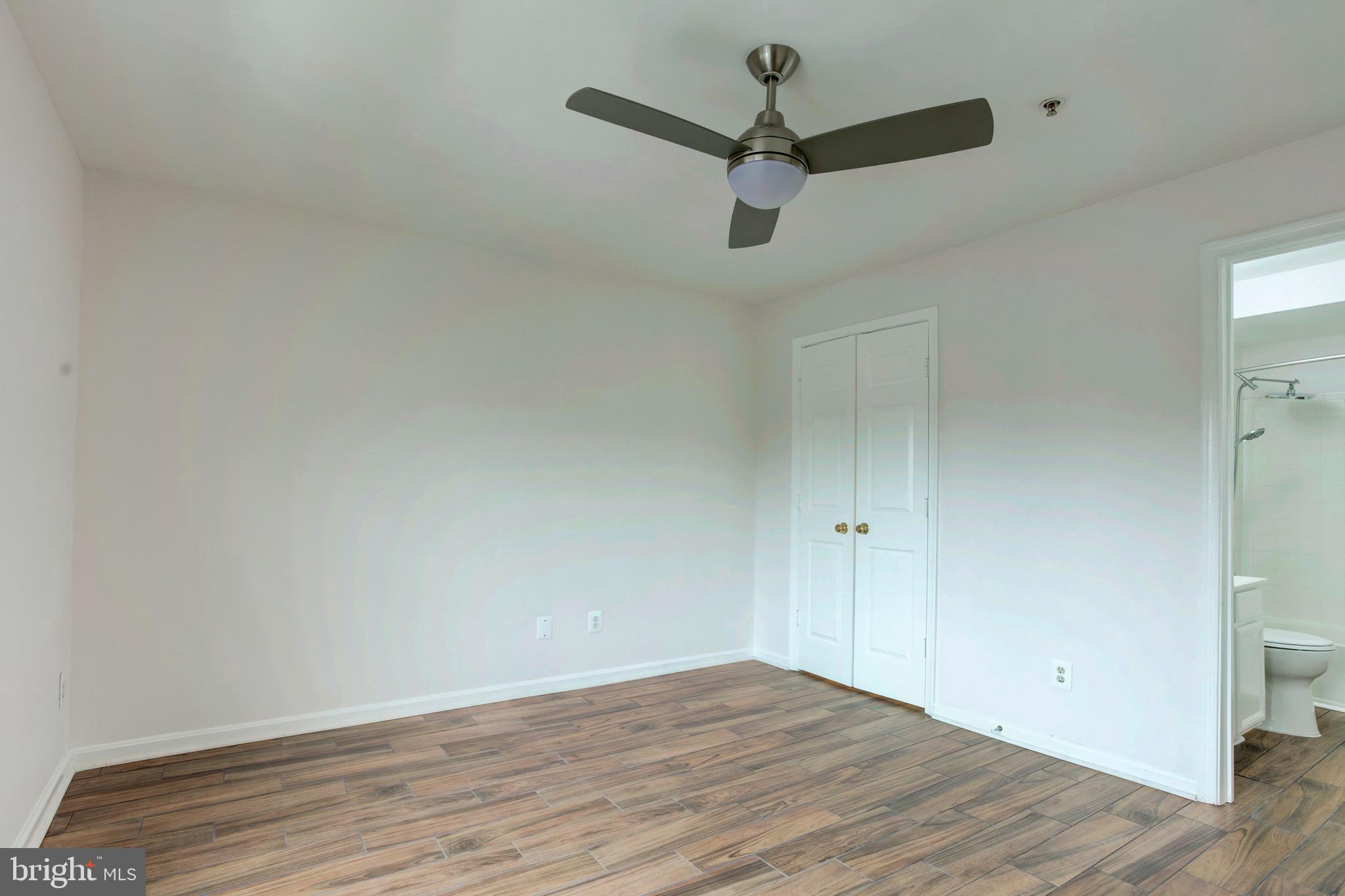 14174 Cuddy Loop, Unit 204 Woodbridge, VA 22193 - Photo 14 of 24 wooden floor in an empty room