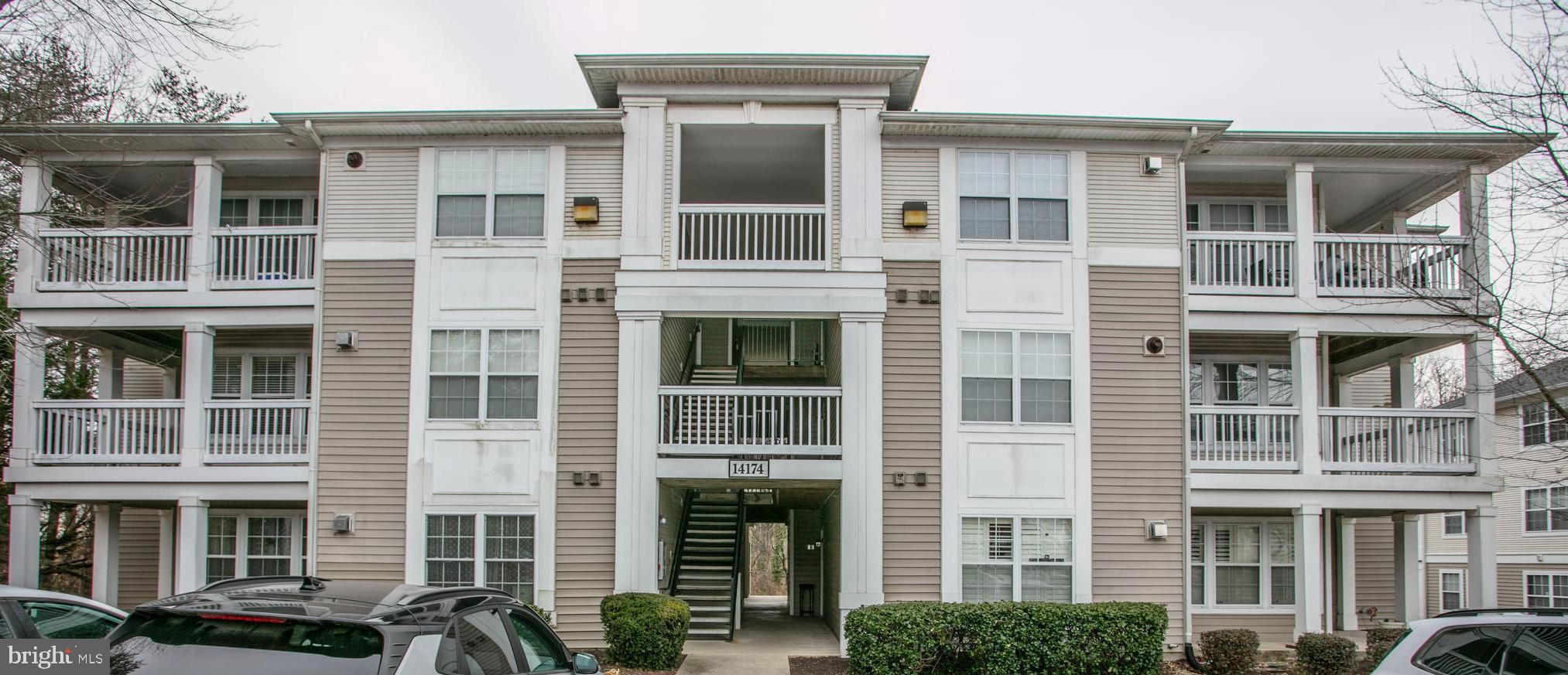 14174 Cuddy Loop, Unit 204 Woodbridge, VA 22193 - Photo 2 of 24 a front view of residential building