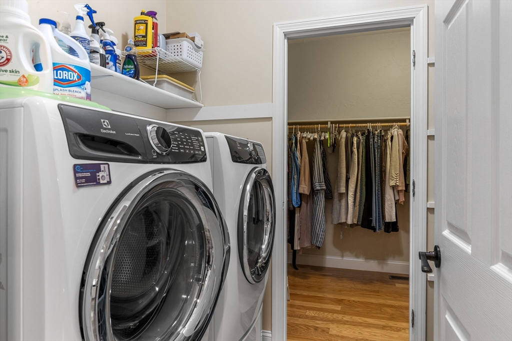116 Grey Hawk Drive, Unit 116 Mashpee, MA 02649 - Photo 22 of 41 a utility room with dryer and washer