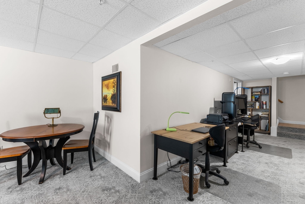 116 Grey Hawk Drive, Unit 116 Mashpee, MA 02649 - Photo 24 of 41 a view of a workspace with furniture