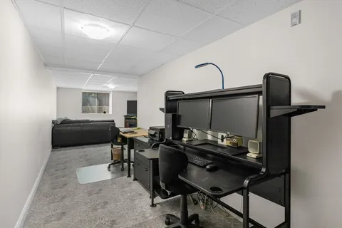 a view of empty room with stairs