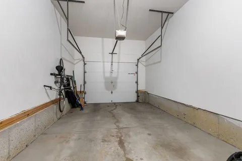 a view of a bike storage and utility room