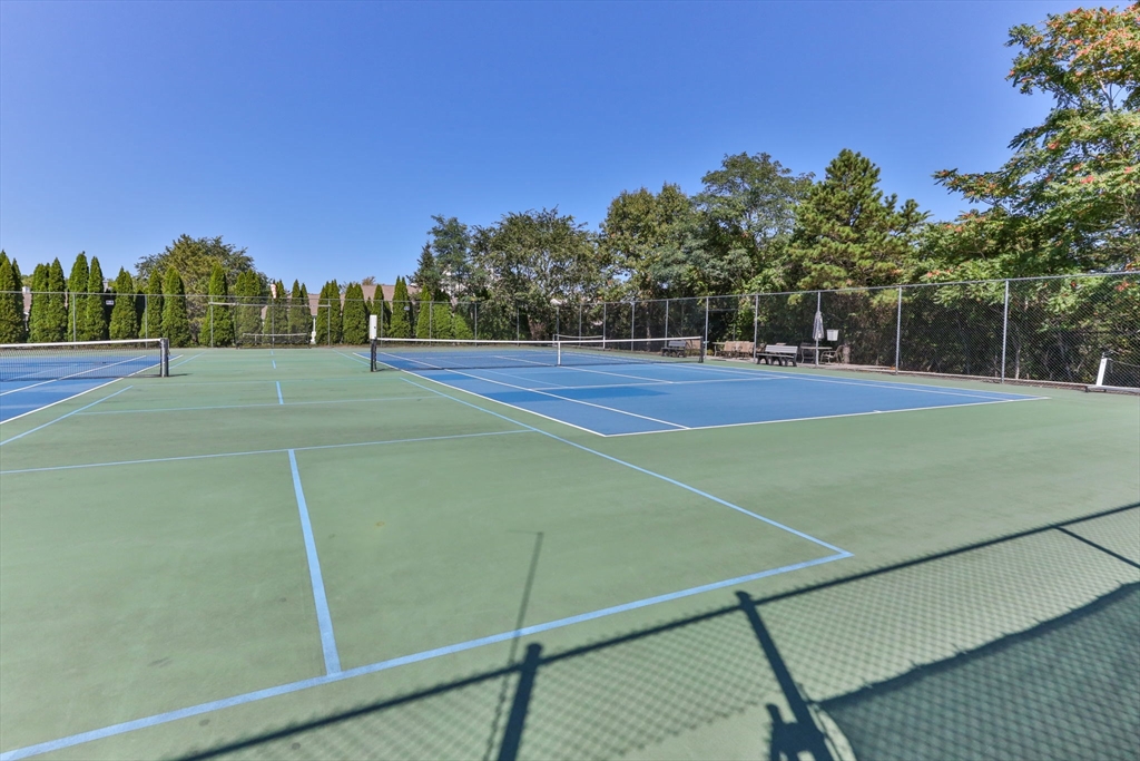 116 Grey Hawk Drive, Unit 116 Mashpee, MA 02649 - Photo 39 of 41 a view of an outdoor space and tennis court