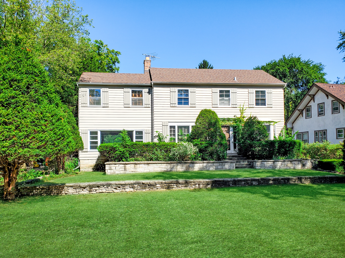 216 Blackhawk Road Riverside, IL 60546 - Photo 1 of 27 a front view of a house with a yard