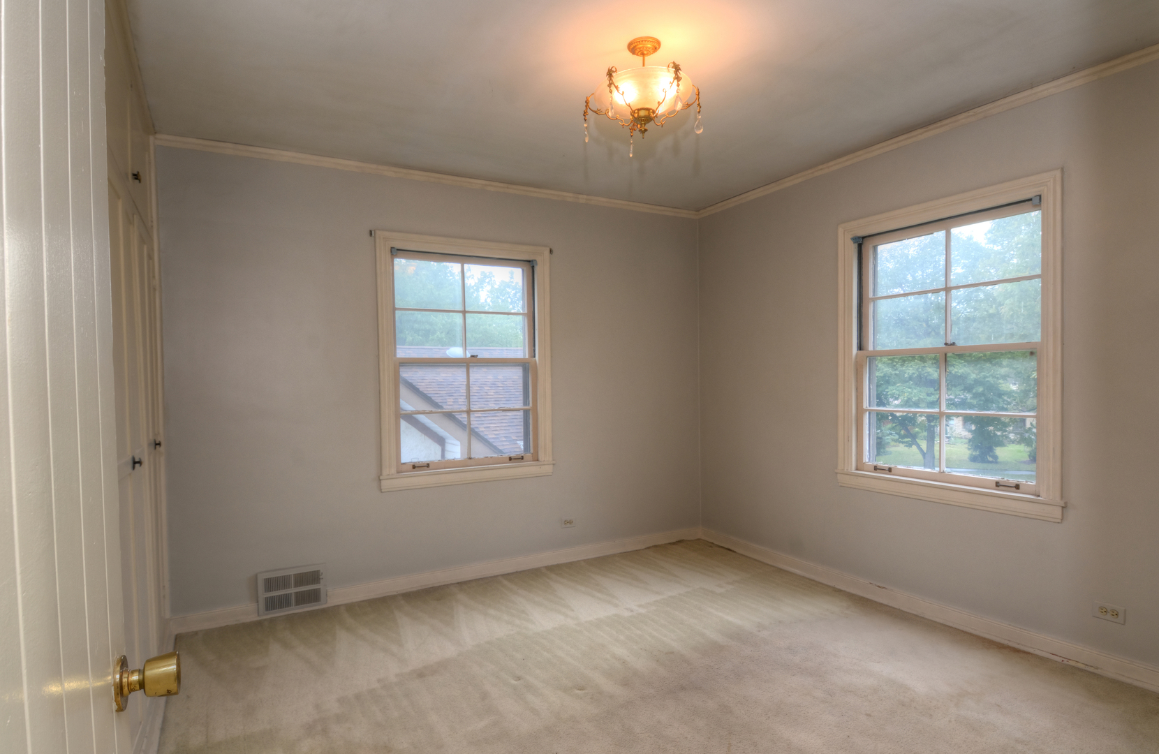 216 Blackhawk Road Riverside, IL 60546 - Photo 13 of 27 an empty room with a window