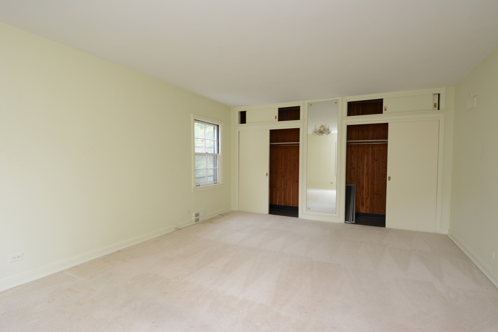 216 Blackhawk Road Riverside, IL 60546 - Photo 15 of 27 a view of empty room with windows