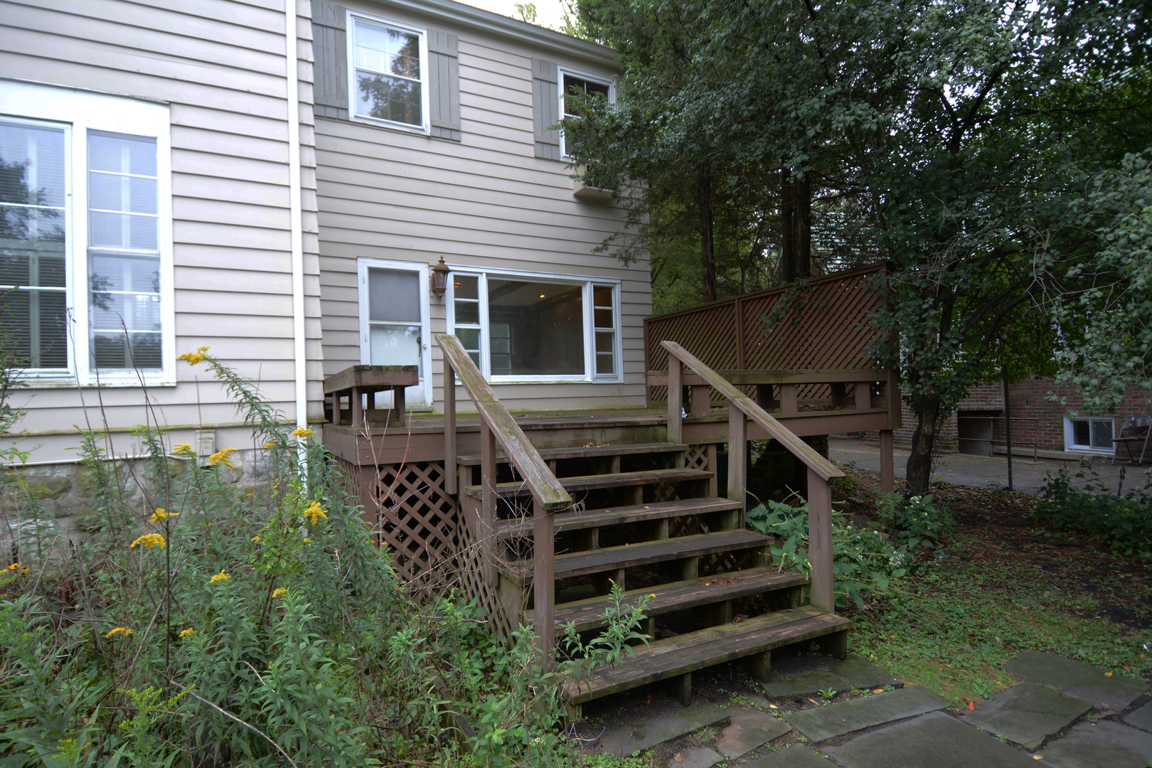 216 Blackhawk Road Riverside, IL 60546 - Photo 24 of 27 a view of a house with backyard and sitting area