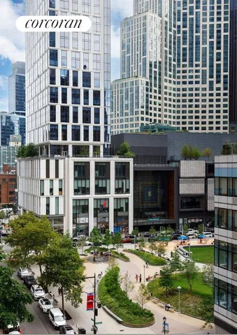 a view of a patio with a table and chairs