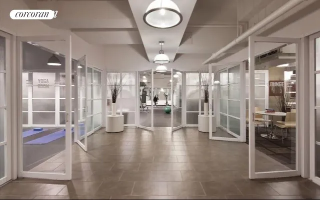 a view of a house with a yard and plants