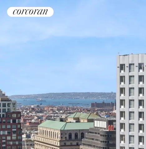 a view of balcony with furniture