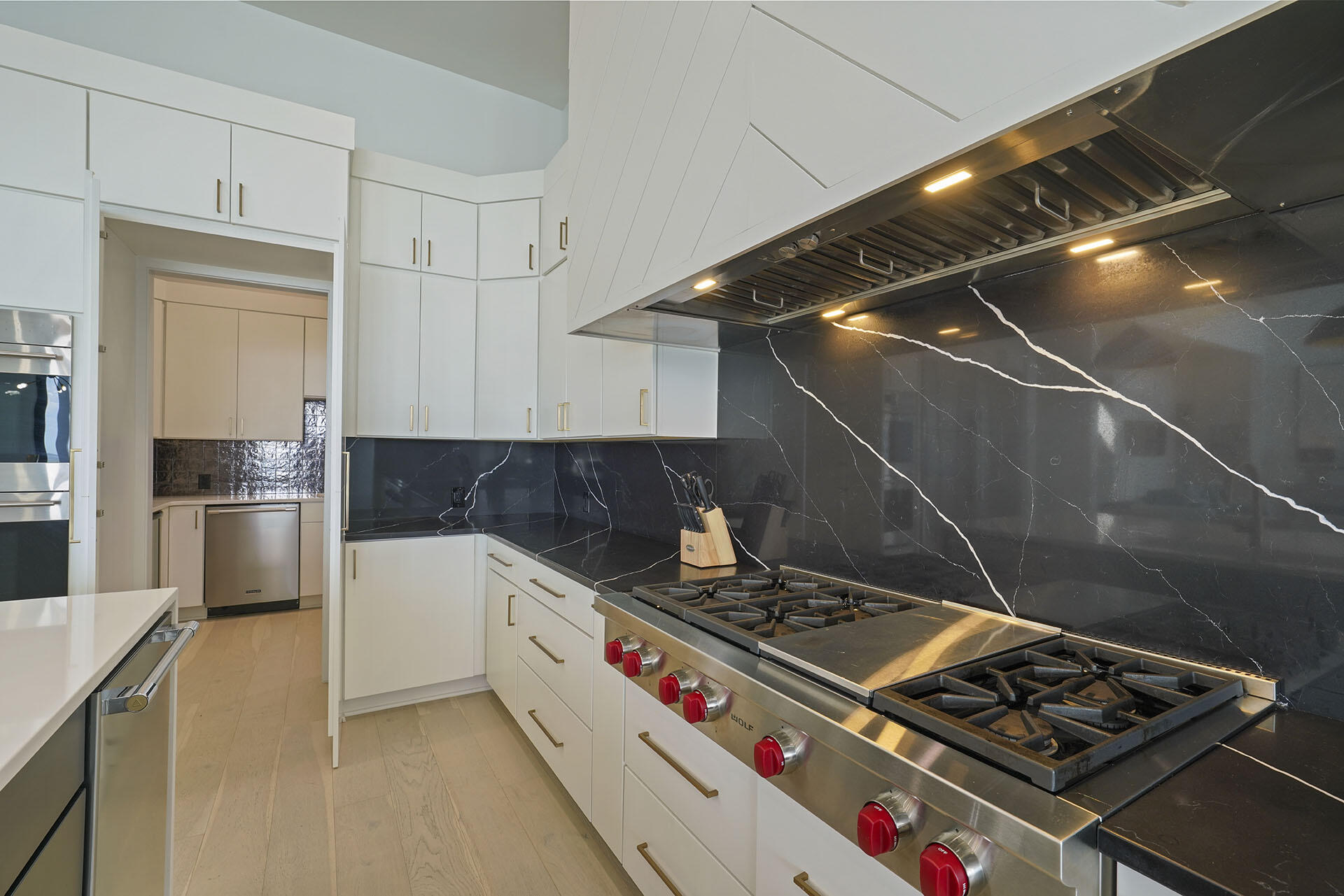 396 Walton Way Miramar Beach, FL 32550 - Photo 13 of 75 a kitchen with stove and cabinets