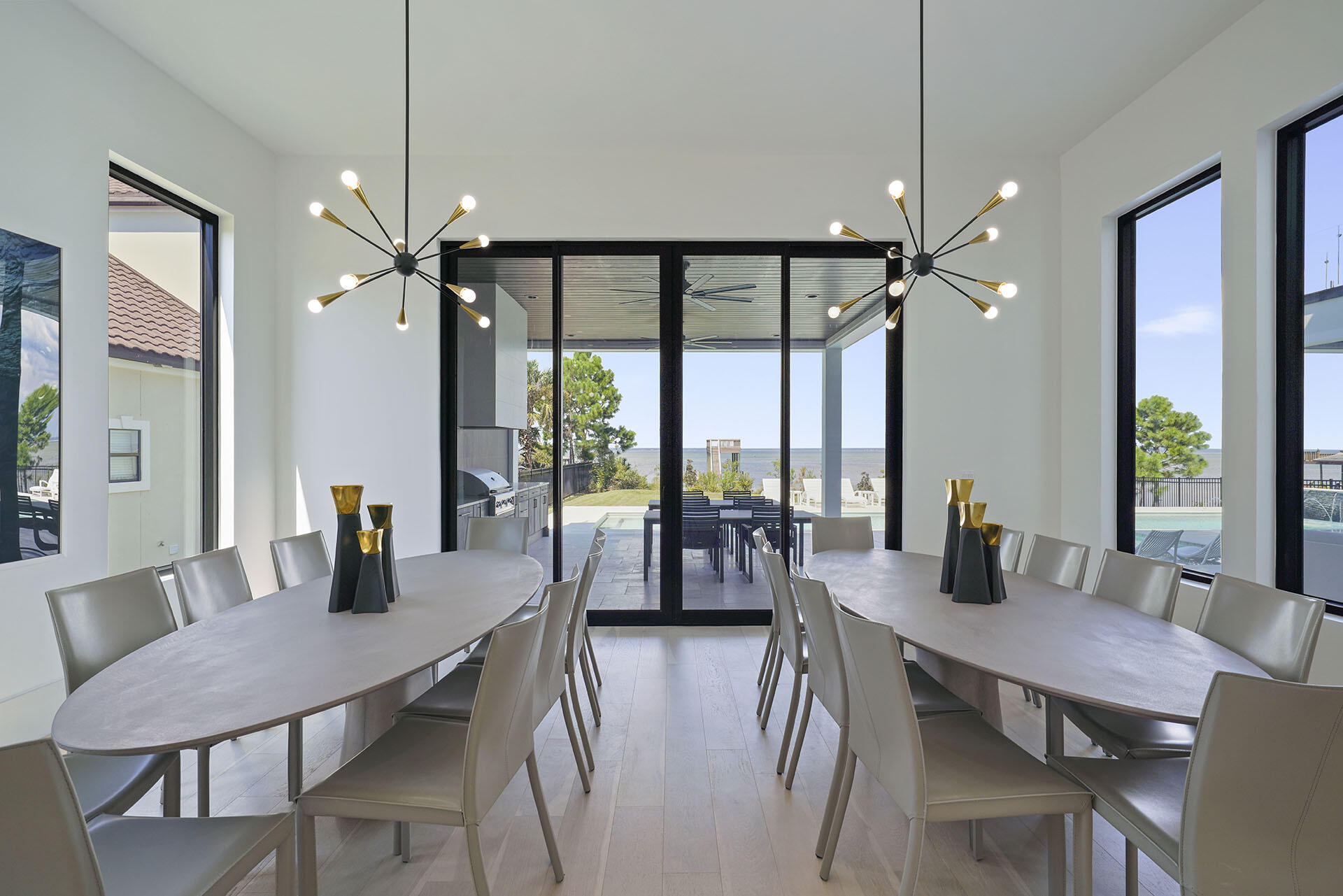 396 Walton Way Miramar Beach, FL 32550 - Photo 17 of 75 a view of a dining room with furniture window and wooden floor