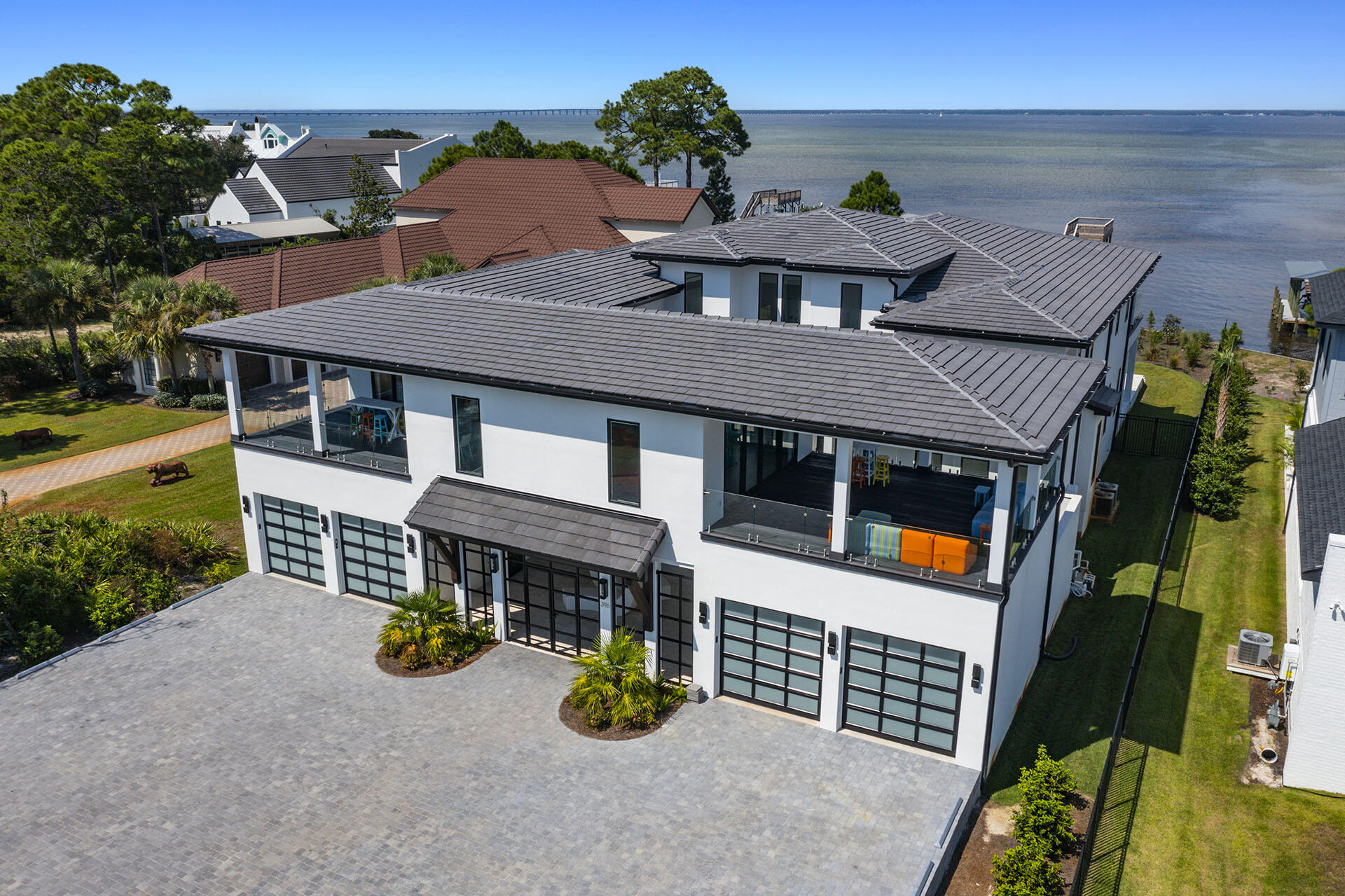 396 Walton Way Miramar Beach, FL 32550 - Photo 2 of 75 an aerial view of a house with swimming pool and patio