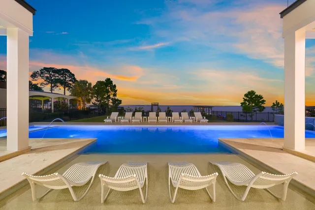 a bedroom with a bed and a night stand