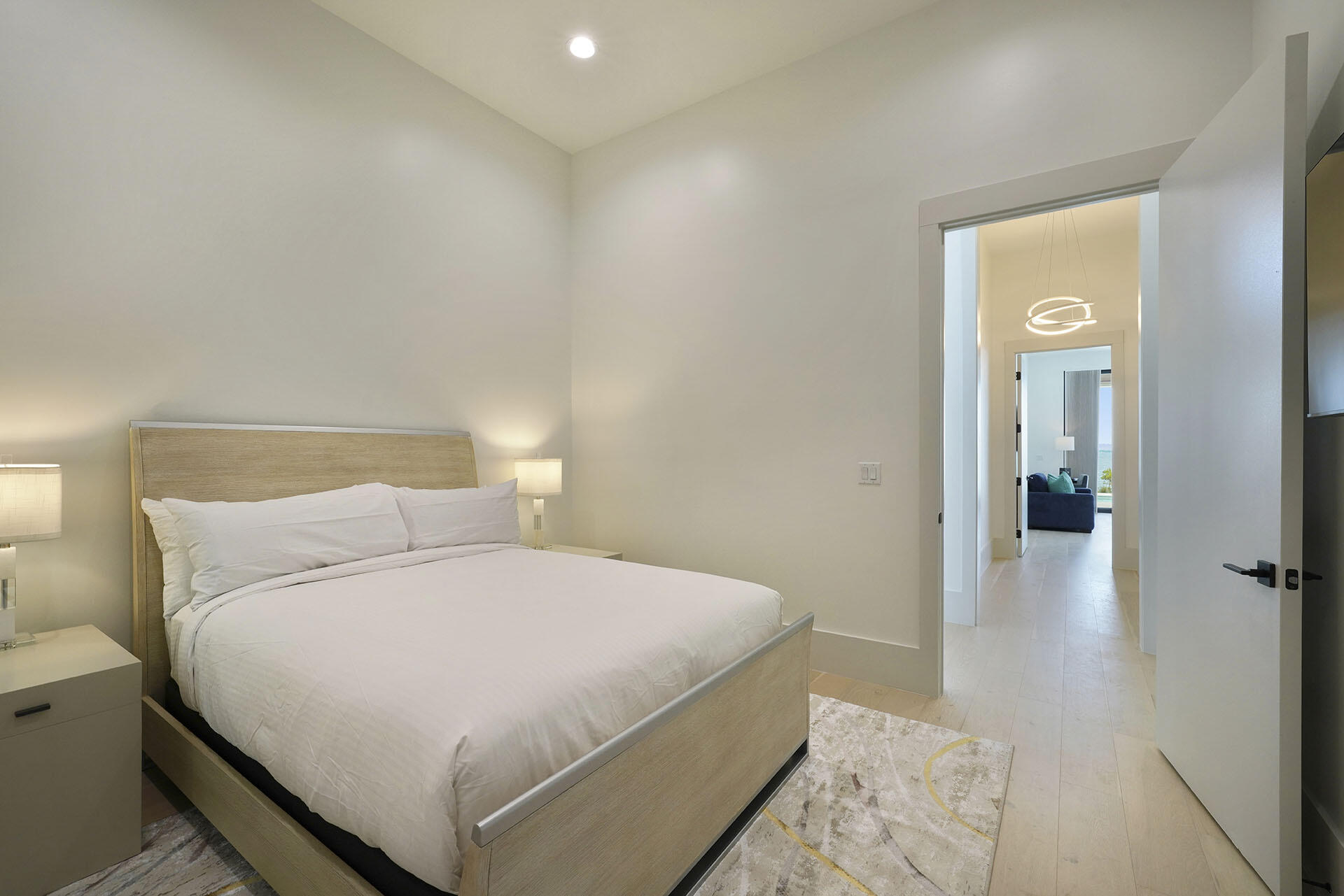 396 Walton Way Miramar Beach, FL 32550 - Photo 42 of 75 a bedroom with a bed and a mirror