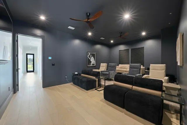 a view of a balcony with chair and wooden floor