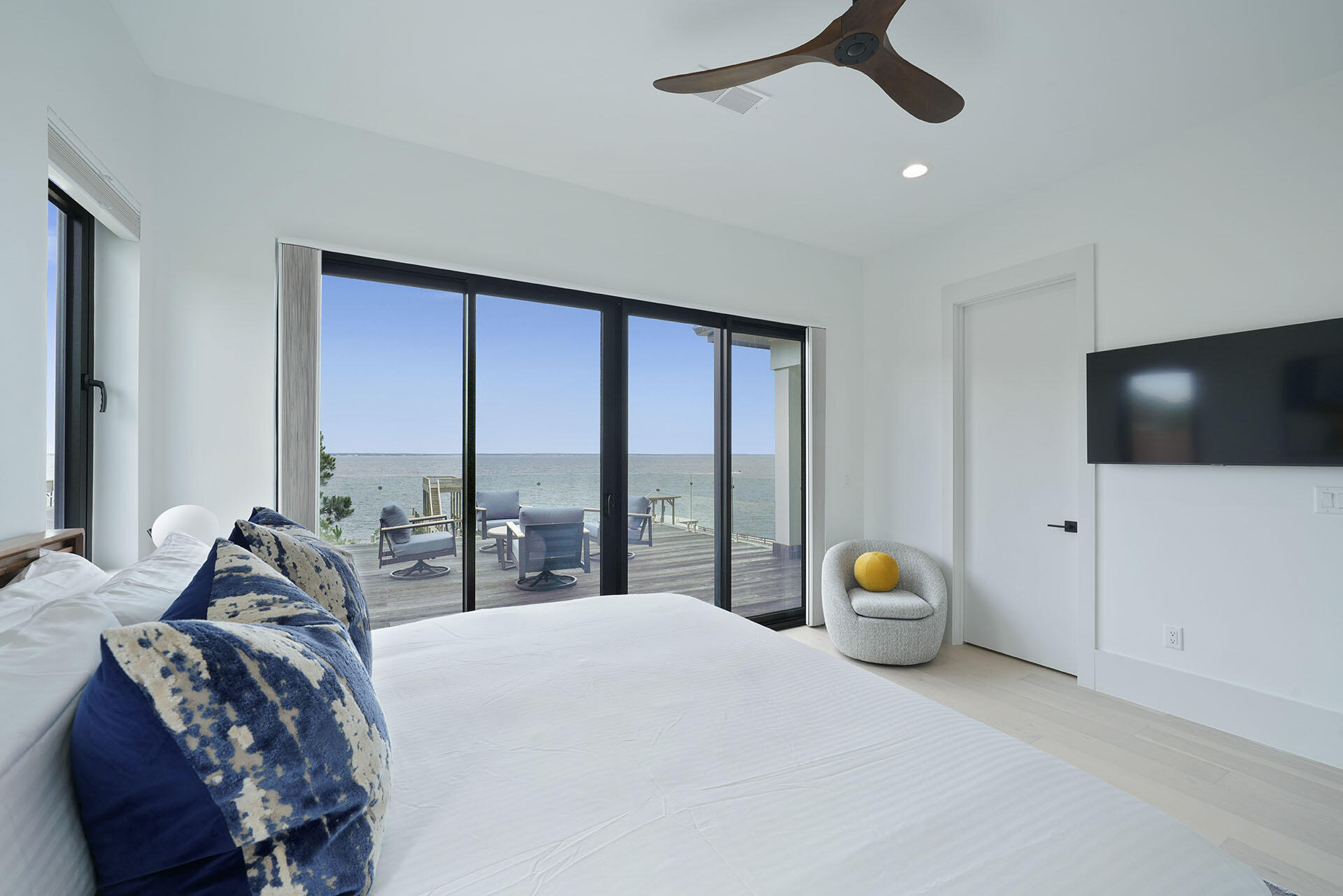 396 Walton Way Miramar Beach, FL 32550 - Photo 53 of 75 a bedroom with a large bed and a flat tv screen