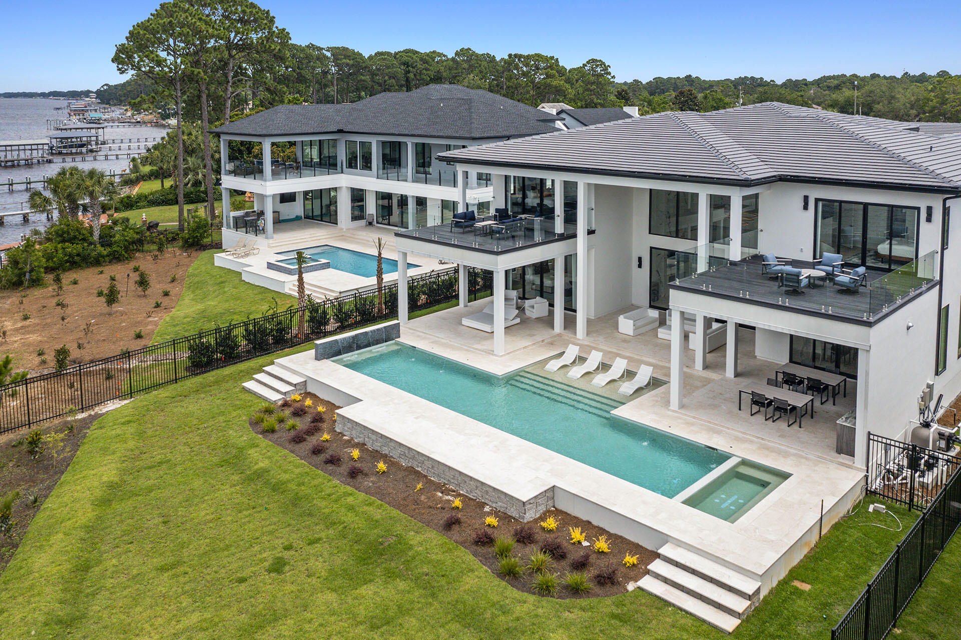 396 Walton Way Miramar Beach, FL 32550 - Photo 70 of 75 a aerial view of a house with a yard