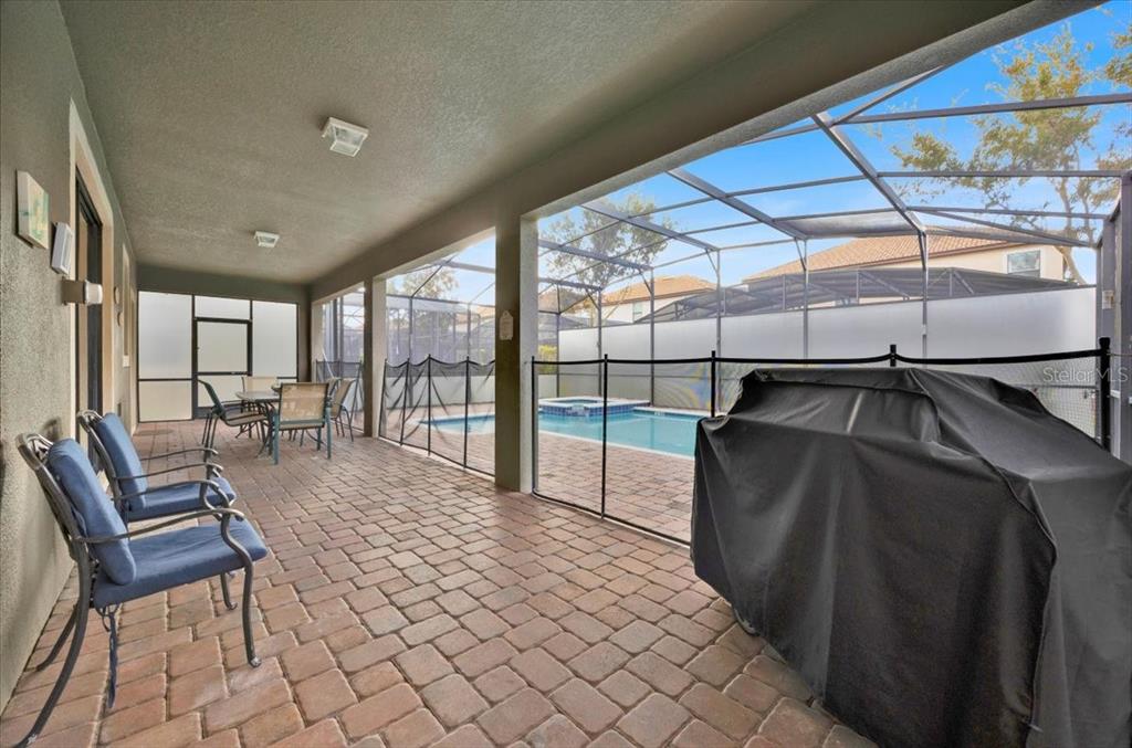 9032 Shadow Mountain Street Davenport, FL 33896 - Photo 32 of 43 a living room with furniture