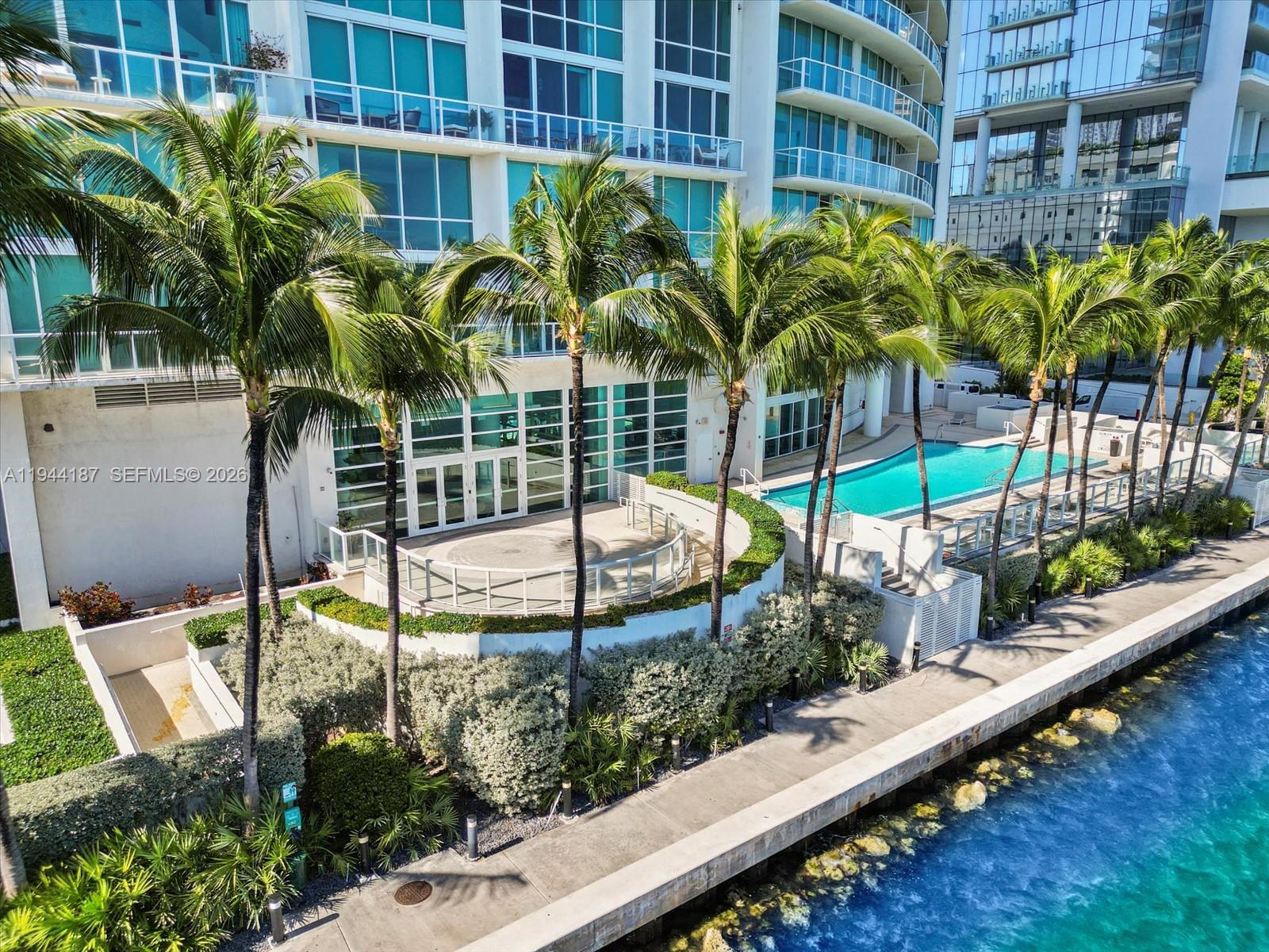 665 Northeast 25th Street, Unit 1101 Miami, FL 33137 - Photo 34 of 47 a view of a palm plant from a balcony