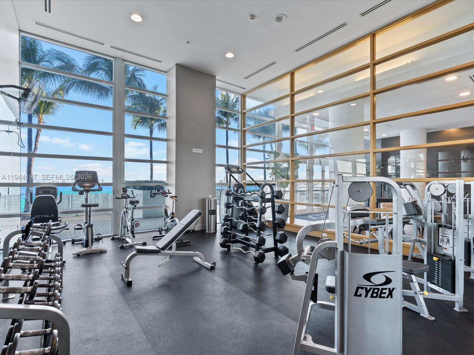 665 Northeast 25th Street, Unit 1101 Miami, FL 33137 - Photo 37 of 47 a view of a room with gym equipment