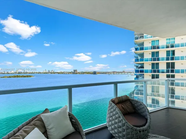 a view of an ocean from a balcony