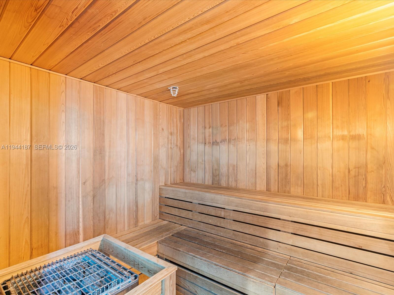 665 Northeast 25th Street, Unit 1101 Miami, FL 33137 - Photo 42 of 47 a view of wooden closet