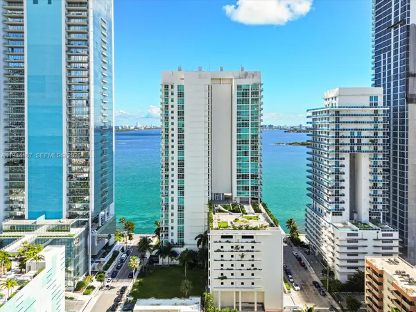 a view of a city with tall buildings