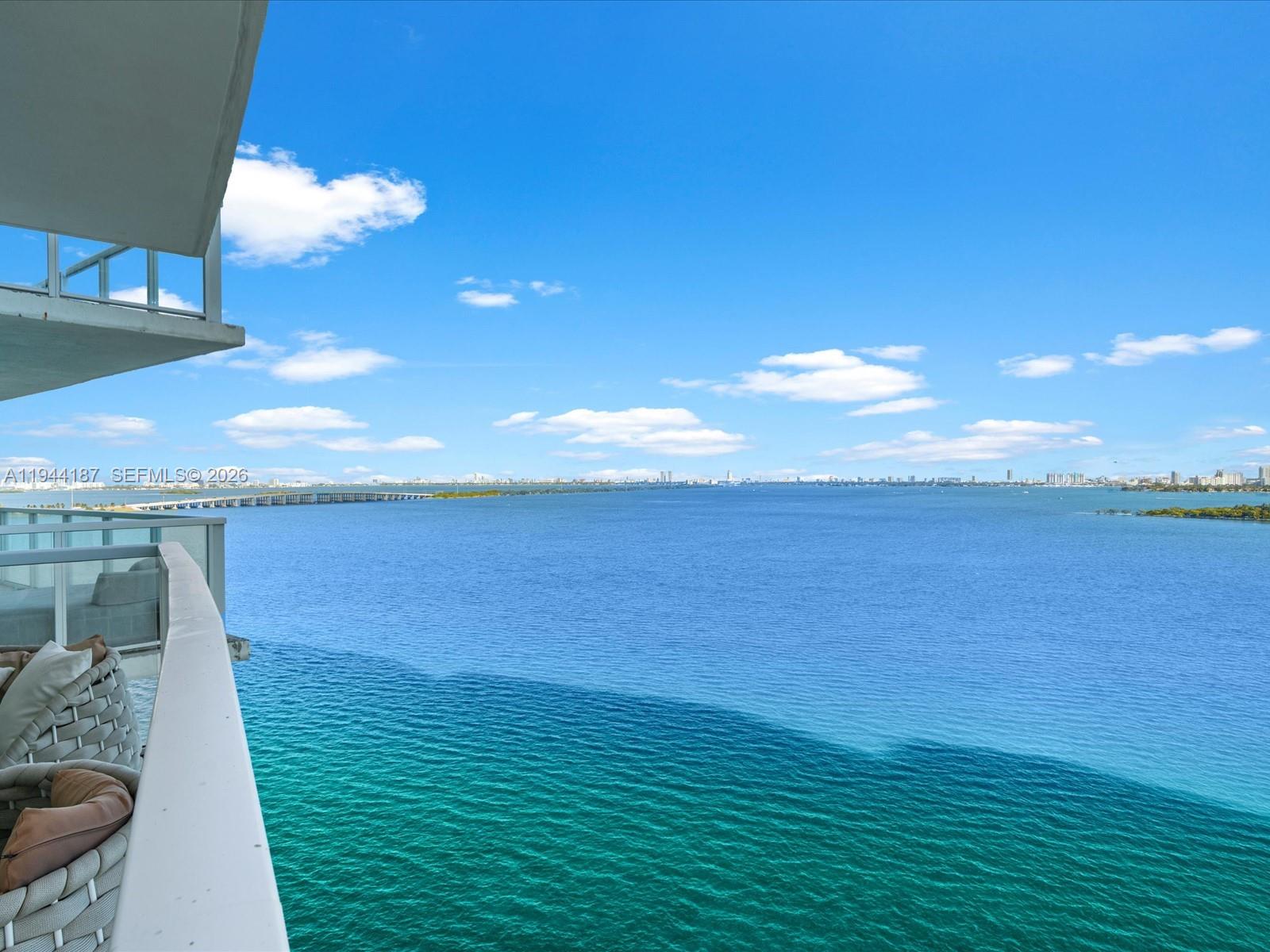 665 Northeast 25th Street, Unit 1101 Miami, FL 33137 - Photo 5 of 47 a view of an ocean from a balcony
