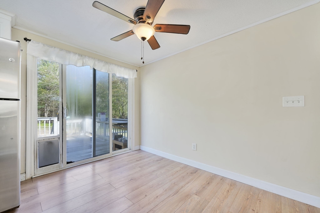41 Standish Avenue Wareham, MA 02538 - Photo 11 of 35 an empty room with wooden floor fan and windows