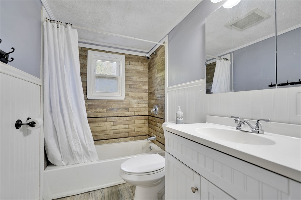 41 Standish Avenue Wareham, MA 02538 - Photo 12 of 35 a bathroom with a sink a toilet and shower