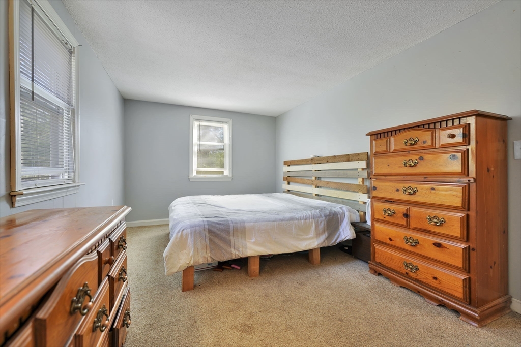 41 Standish Avenue Wareham, MA 02538 - Photo 13 of 35 a bedroom with a bed and a window