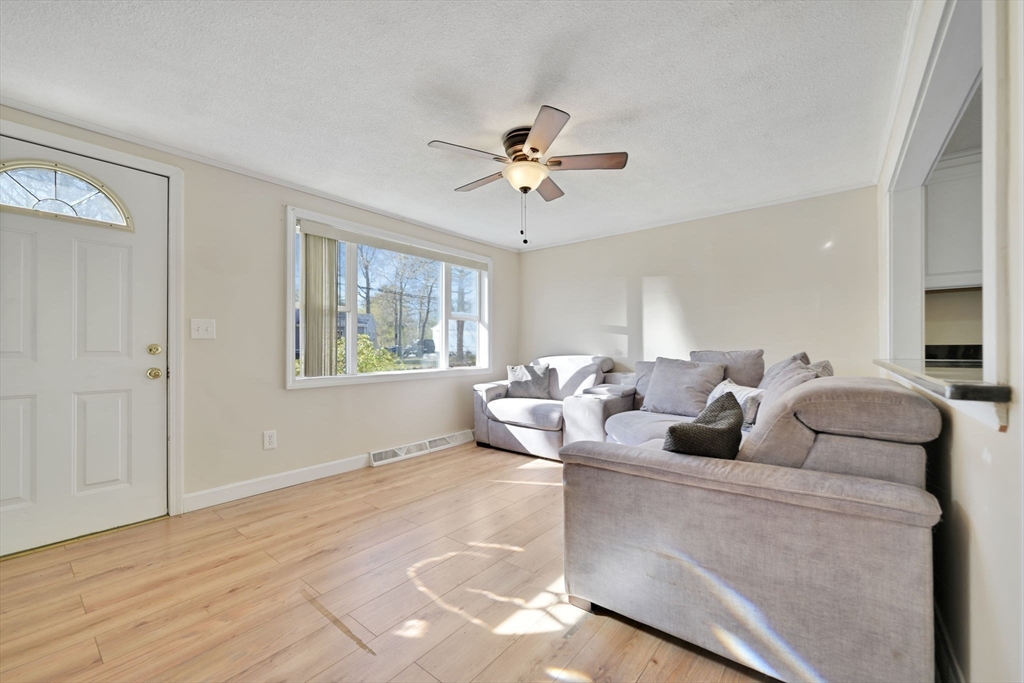 41 Standish Avenue Wareham, MA 02538 - Photo 5 of 35 a living room with furniture and a window