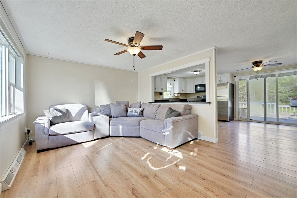 41 Standish Avenue Wareham, MA 02538 - Photo 6 of 35 a living room with furniture and a large window