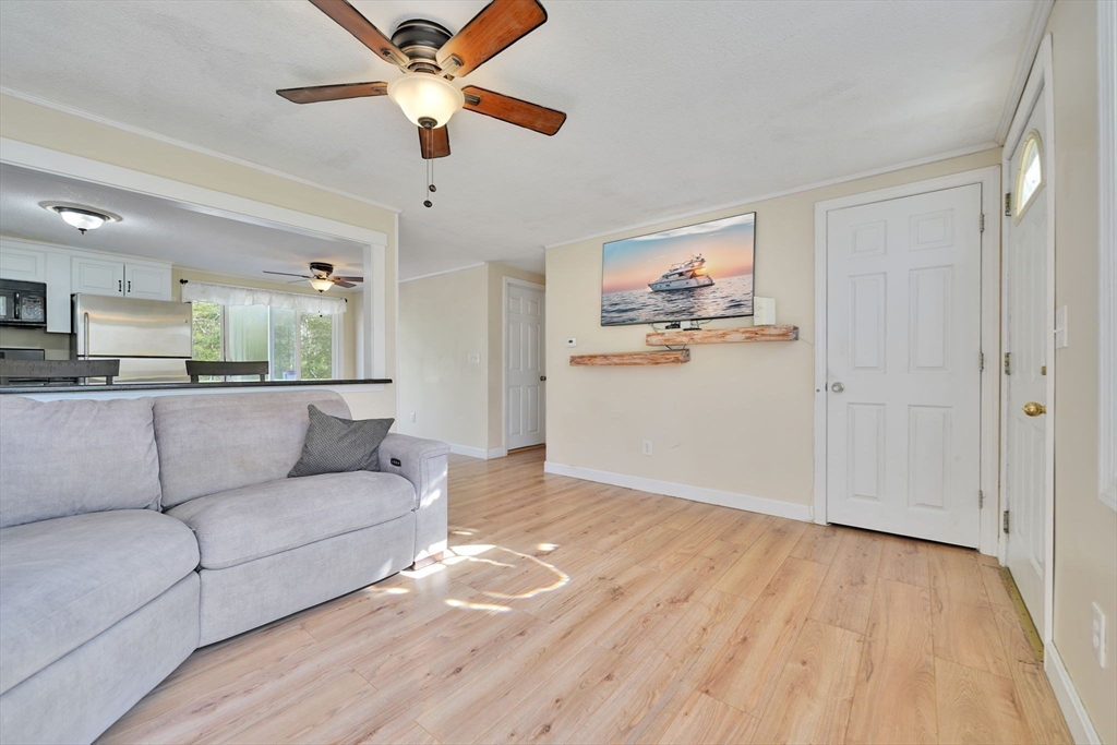 41 Standish Avenue Wareham, MA 02538 - Photo 7 of 35 a living room with furniture and a wooden floor