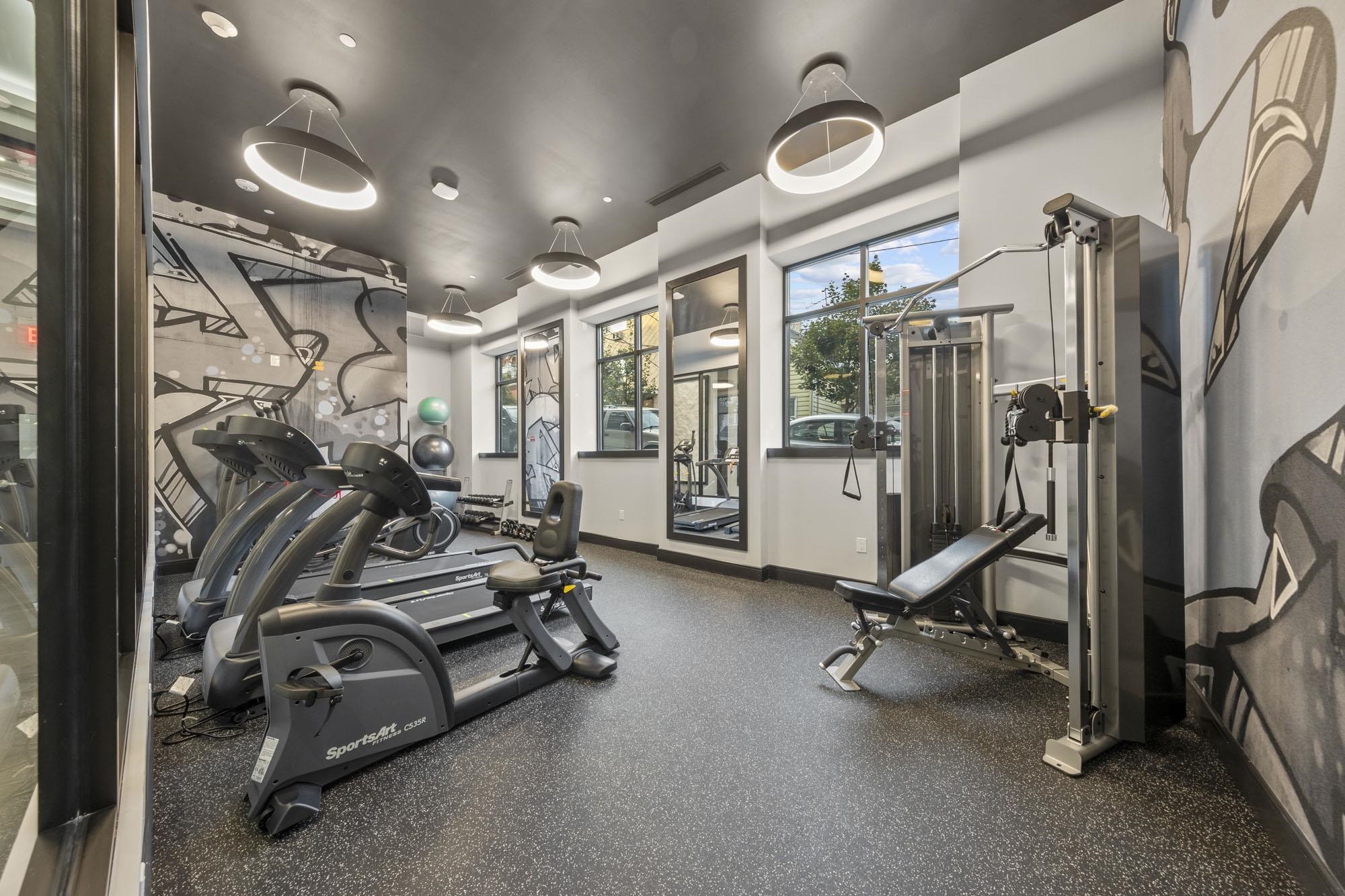 121 34th Street, Unit 401 Union City, NJ 07087 - Photo 23 of 44 a view of a room with gym equipment