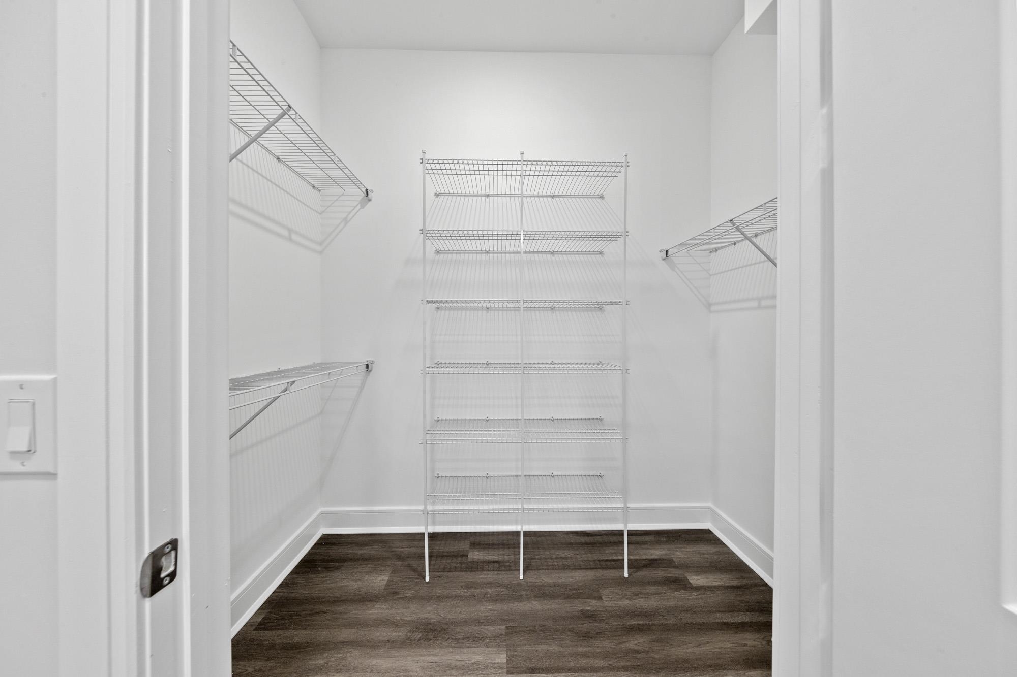 121 34th Street, Unit 401 Union City, NJ 07087 - Photo 5 of 44 a view of walk in closet with empty racks