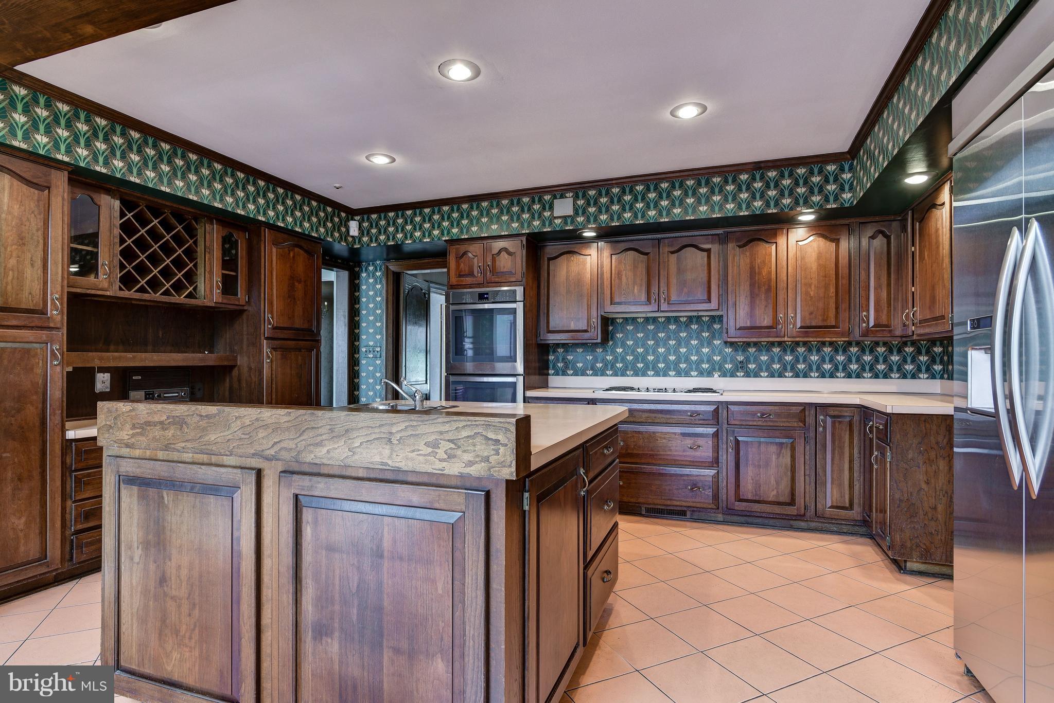 7425 Arrowood Road Bethesda, MD 20817 - Photo 7 of 25 Kitchen with island